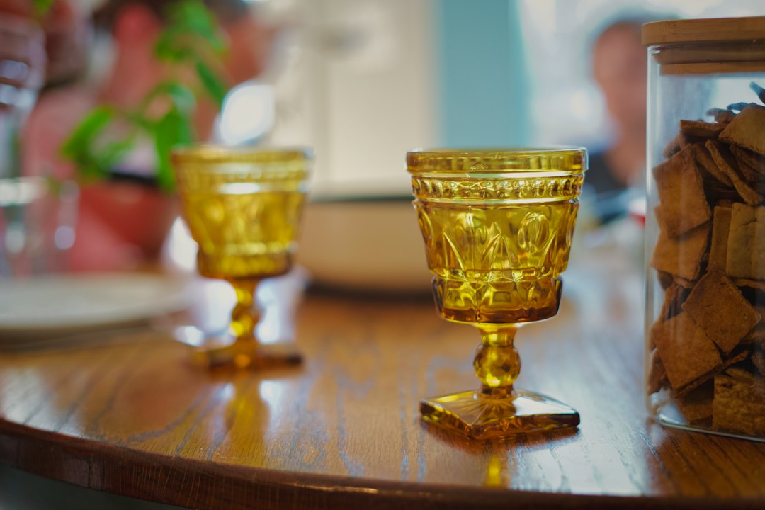 Amber glassware on a wooden table for nostalgic fall decor