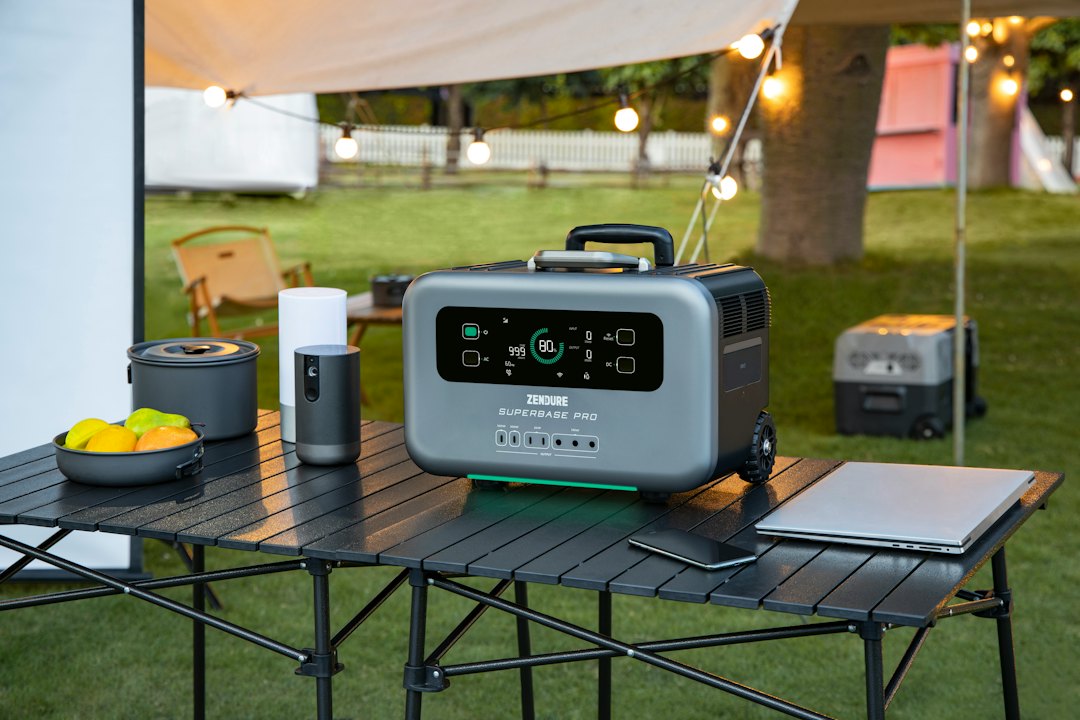 Portable power station in an outdoor camping setup
