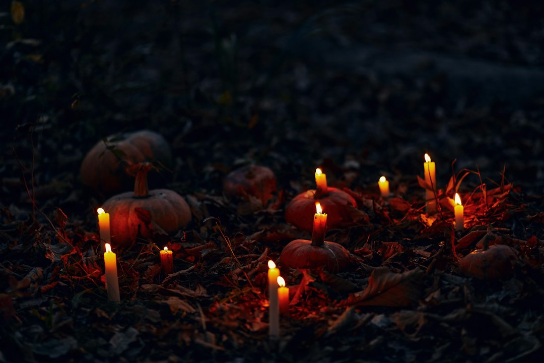 Pumpkins and candles styled for elegant Halloween decor