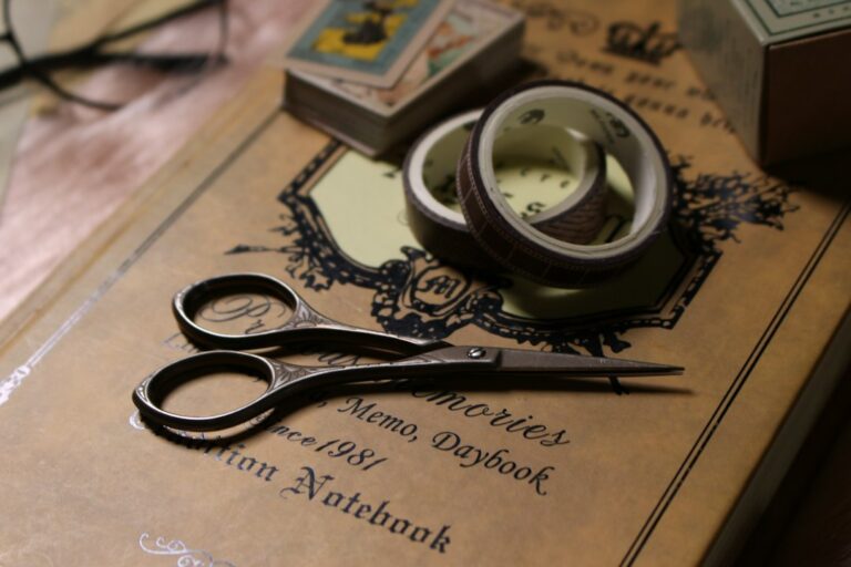 Creative zine and journaling supplies arranged on a desk